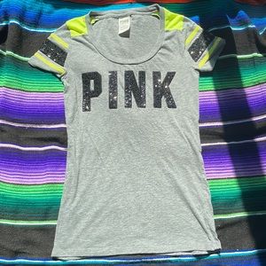 Pink grey, black and neon yellow sequin shirt. Size small.